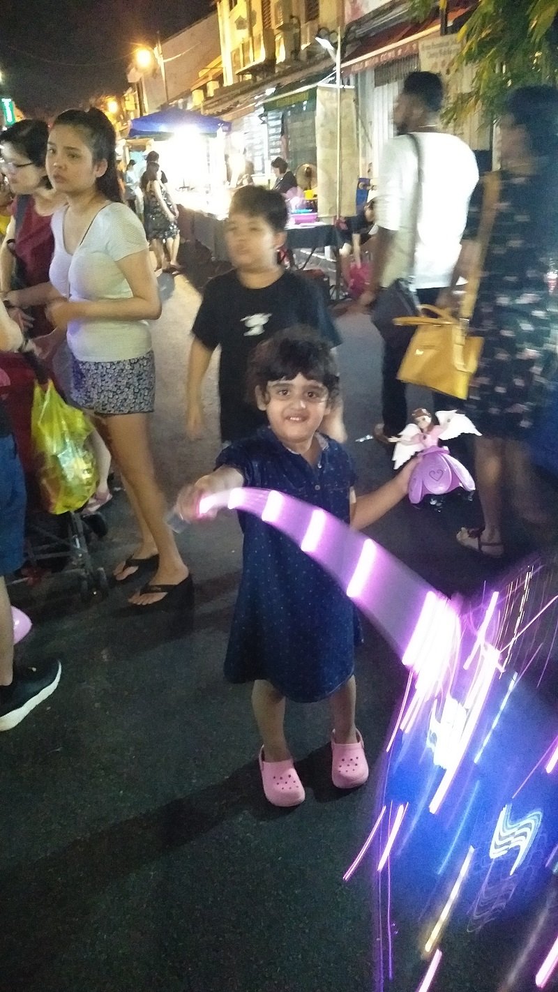 a young visitor in jonker street melaka